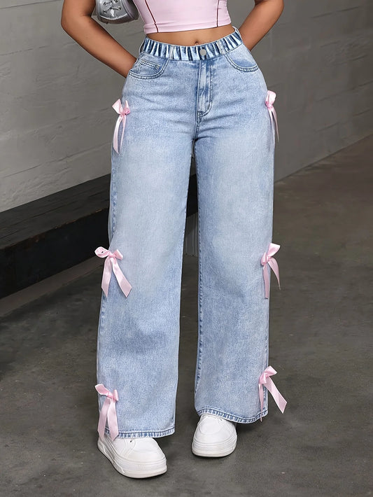wide-leg jeans with pink side bows.
